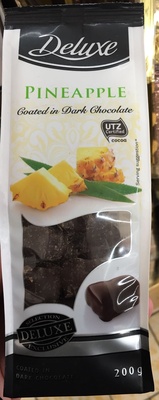 Pineapple coated in dark chocolate front packaging