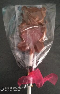 Sucettes en chocolat au lait, colorées front packaging