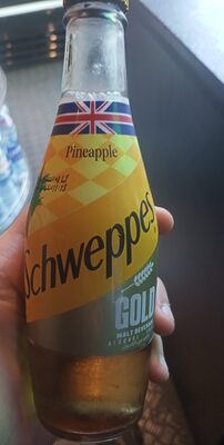 Schweppes gold pineapple glass front packaging