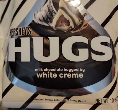Hugs - Milk Chocolate Hugged by White Creme front packaging
