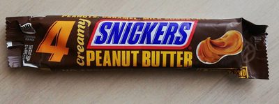 Creamy peanut butter, peanuts, caramel, milk chocolate squares front packaging