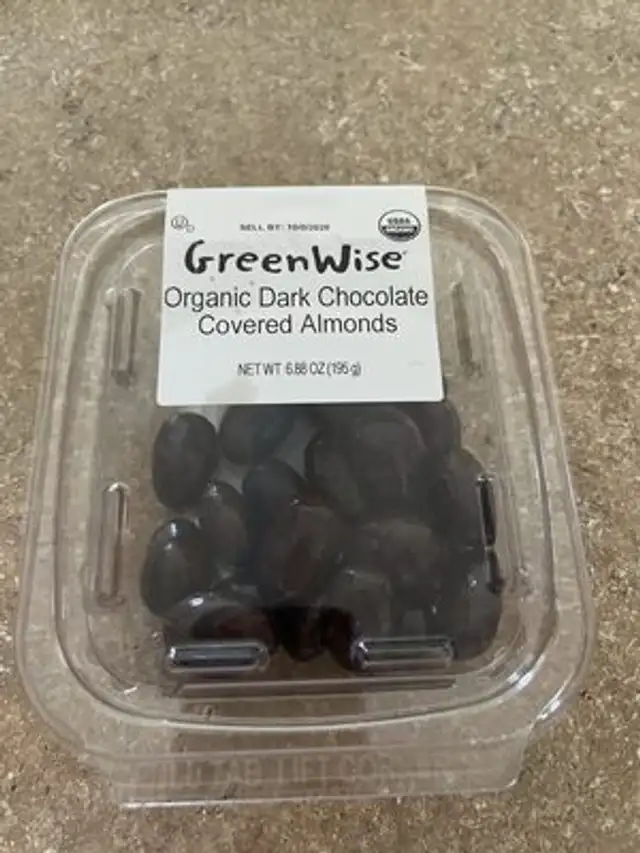 Organic dark chocolate covered almonds front packaging