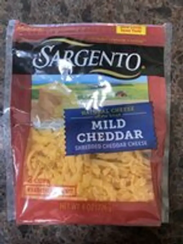 Traditional Cut Shredded Natural Mild Cheddar Cheese