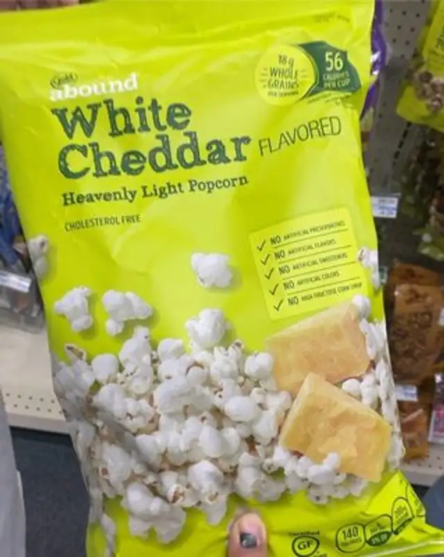Abound white cheddar flavored heavenly light popcorn