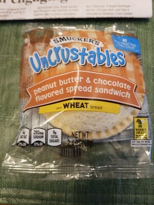 Uncrustables peanut butter & chocolate flavored spread sandwich