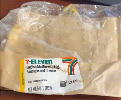 Muffin with cheese, egg and sausage