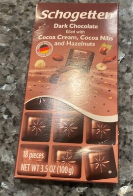 Dark Chocolate filled with Cocoa Cream, Cocoa Nibs and Hazelnuts front packaging