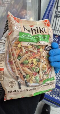 Steamed white rice stir-fried with white meat chicken, carrots, onions, edamame, red peppers and scrambled eggs, chicken fried rice front packaging