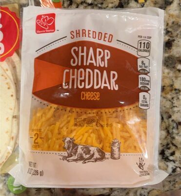 Shredded sharp cheddar cheese