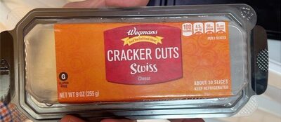 Cracker cuts swiss cheese