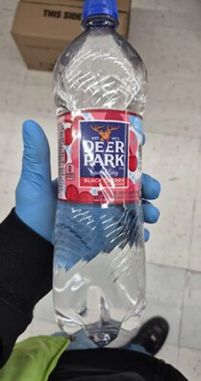 Black cherry sparkling natural spring water, black cherry