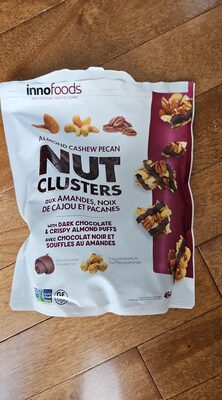 Premium Nut Clusters with Dark Chocolate & Crispy Almond Puffs front packaging