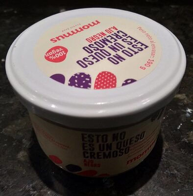 Esto no es un queso Ajo negro front packaging