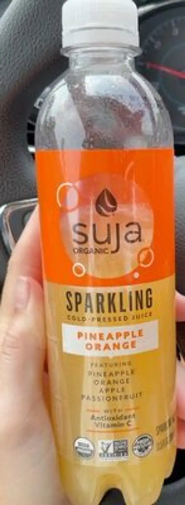 Sparkling cold-pressed juice orange pineapple