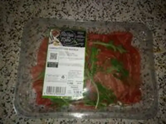 Carpaccio con rucola