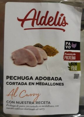 Pechuga adobada al curry