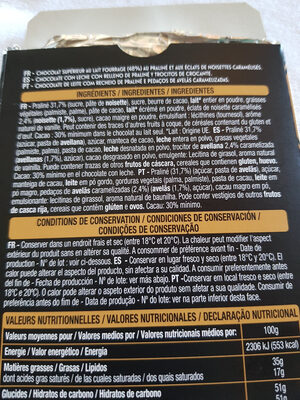 AUCHAN GOURMET CHOCOLAT AU LAIT FOURRÉ PRALINÉ et PÉPITES DE NOUGATINE 150G ingredients label
