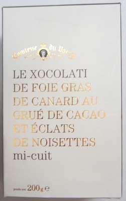 Le xocolati de foie gras de canard au grué de cacao et éclats de noisettes mi-cuit