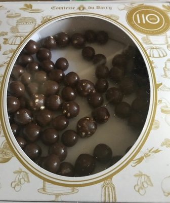 Billes de cereales enrobees de chocolat au lait front packaging