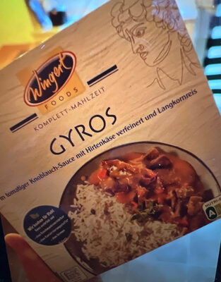 Gyros in Tomaten Knoblauch-Sauce mit Hirtenkäse verfeinert und Langkornreis