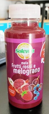 Mela, frutti rossi e melograno