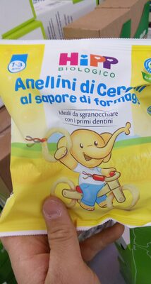 Anellini di cereali al sapore di formaggio front packaging