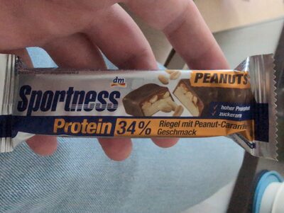 Protein Riegel mit Peanut-Caramel Geschmack front packaging