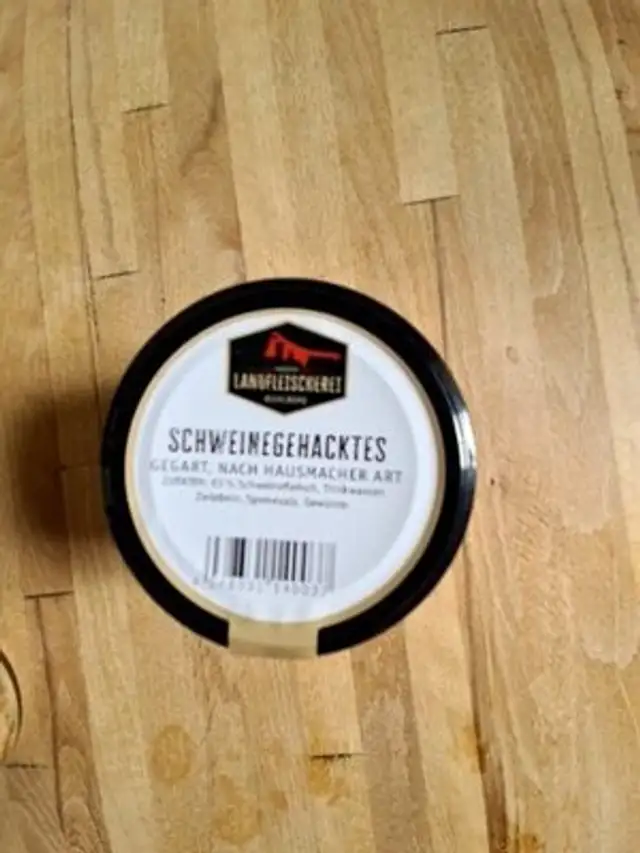 Schweinegehacktes im Glas front packaging