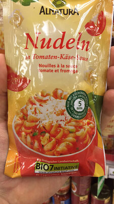 Noodles with tomato sauce and cheese front packaging