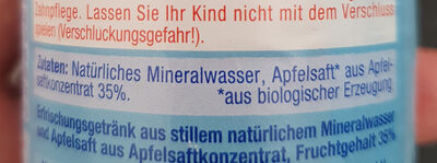 Bio Apfel mit stillem Mineralwasser front packaging