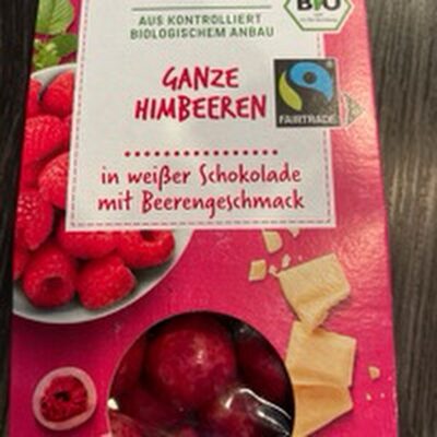 Ganze Himbeeren in weißer Schokolade mit Beerengeschmack
