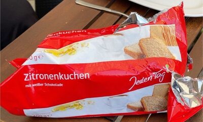 Zitronenkuchen mit weißer Schokolade front packaging