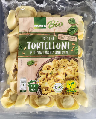 Tortellini mit Spinat und Pinienkernen