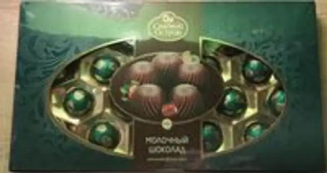 шоколадные конфеты из молочного шоколада с цельным лесным орехом