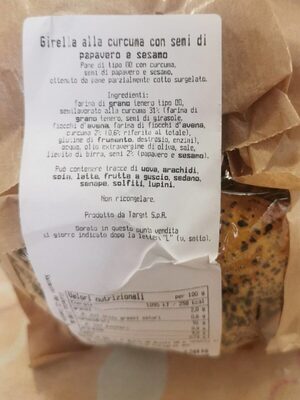 Girella alla curcuma con segni di papavero e sesamo