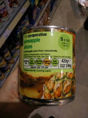 Pineapple slices in pineapple juice from concentrate