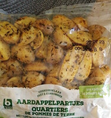 Quartier de pomme de terre, au thym et romarin