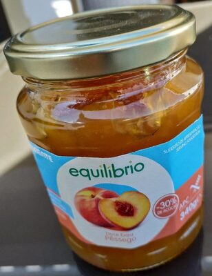 Doce extra pêssego front packaging