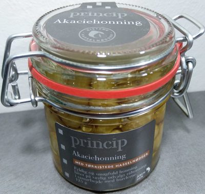 Akaciehonning med tørristede hasselnødder front packaging