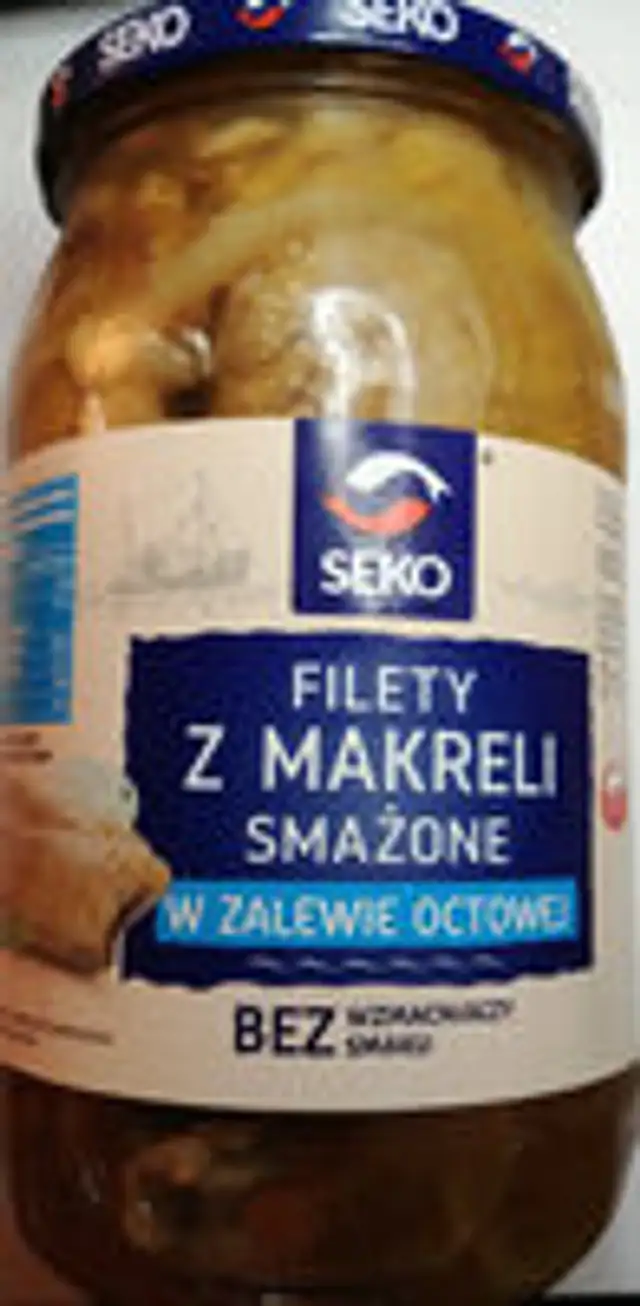 Fried mackerel fillets with skin in marinade with sugar and sweeteners
