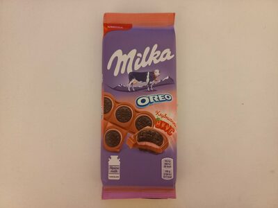 Шоколад молочный Milka с круглым печеньем Oreo с начинкой со вкусом клубники
