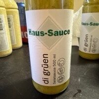 di grüen front packaging