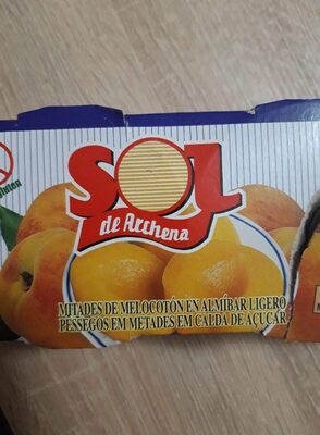 Mitades de melocotón en almibar