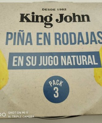 Piña en rodajas en su jugo natural