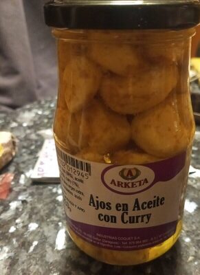 Ajos en aceite con curry front packaging
