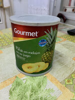 Piña en rodajas en su jugo