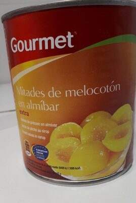 Mitades de melocotón en almíbar