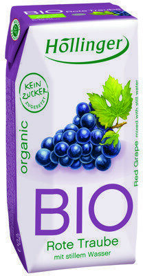 Rote Traube mit stillem Wasser